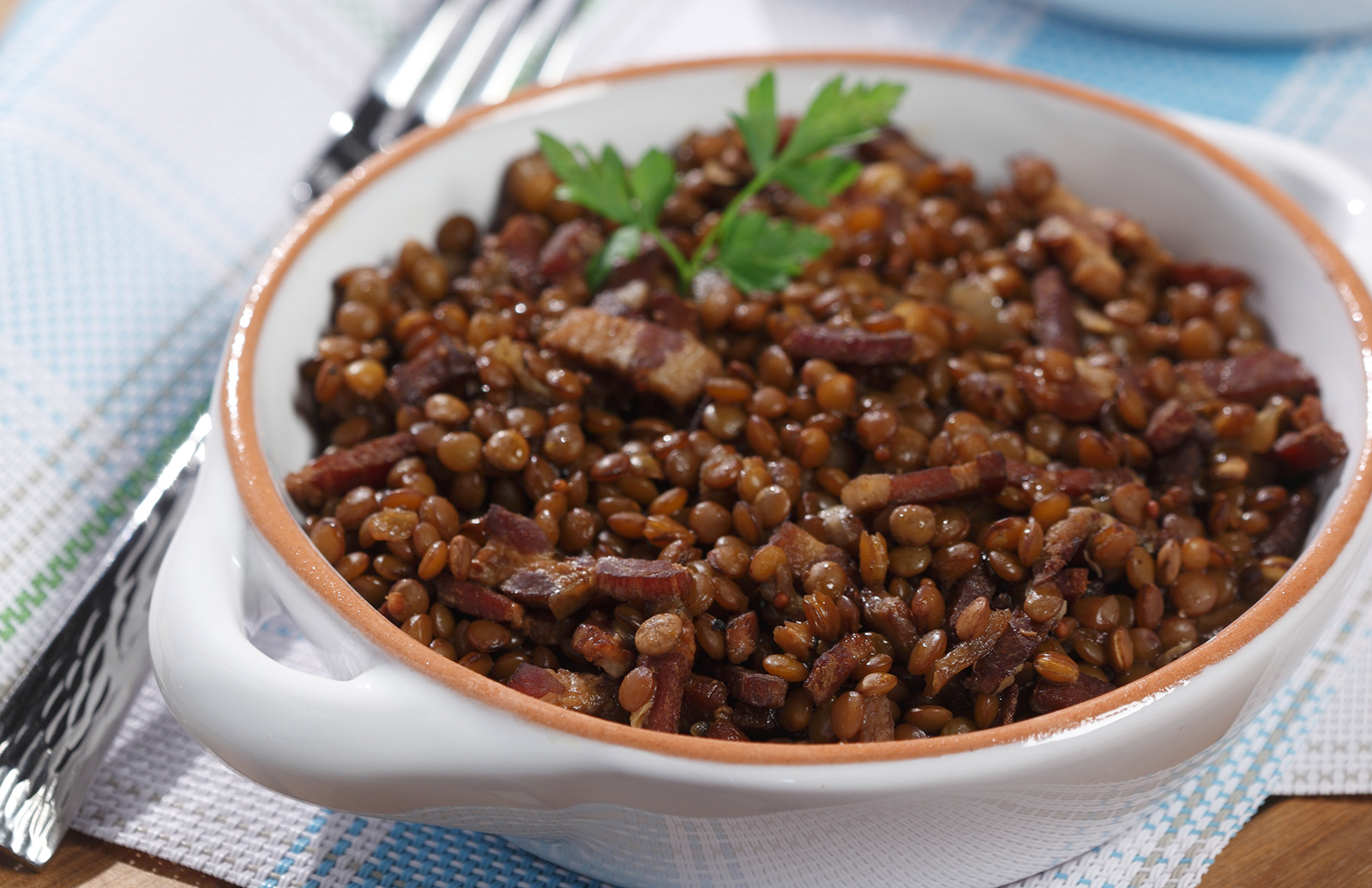 This recipe brings lentils into a baked bean-like recipe along with flavour...