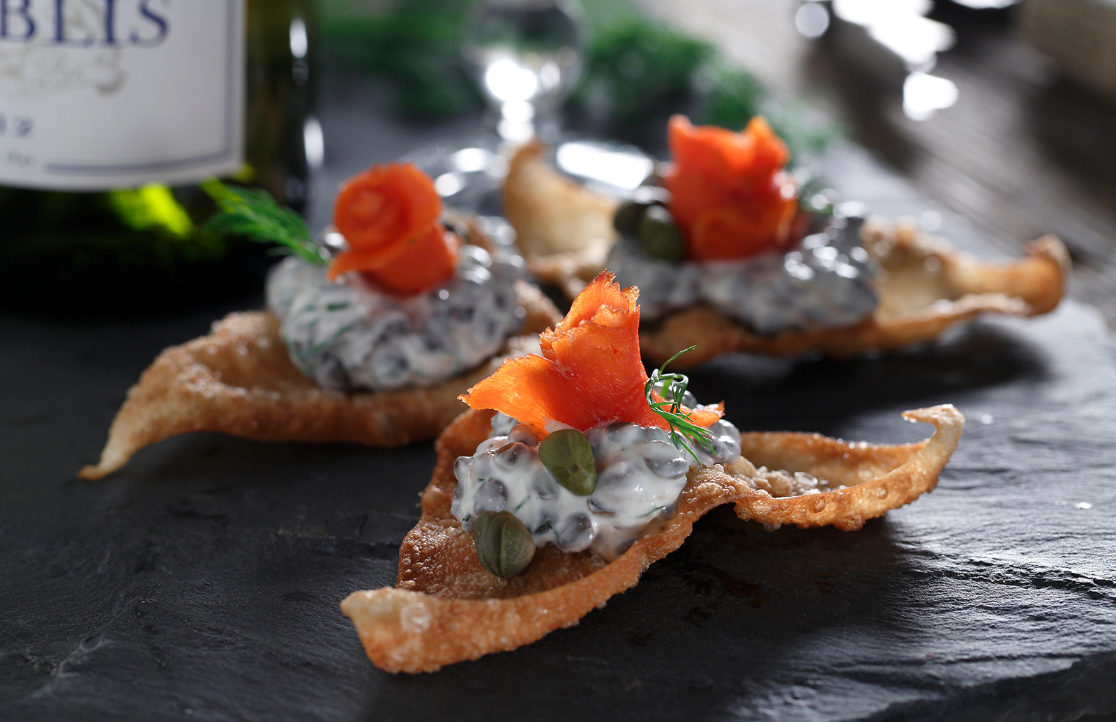 Smoked Salmon Rosettes with Dill Lentil Cream on Crispy Wontons